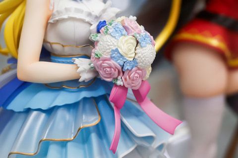 The bouquet she holds is gorgeous too